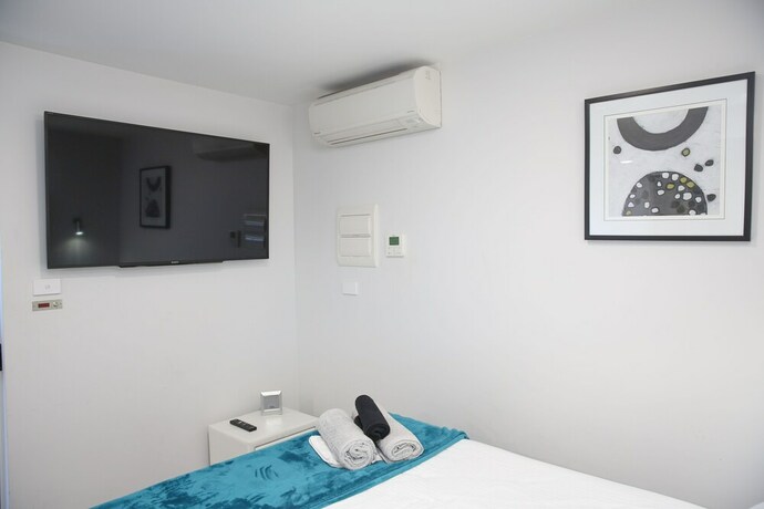 Imagen de la habitación del Hotel The Mark Studios. Foto 32