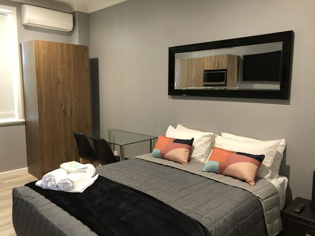Imagen de la habitación del Hotel The Mark Studios. Foto 39
