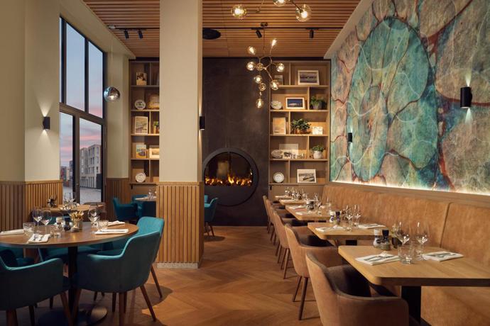 Imagen del bar/restaurante del Hotel The Market. Foto 2