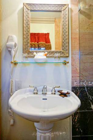 Imagen de la habitación del Hotel The Marlo. Foto 12