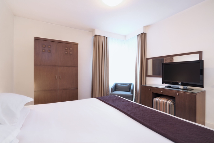 Imagen de la habitación del Hotel The Marmara Suadiye Residence. Foto 14