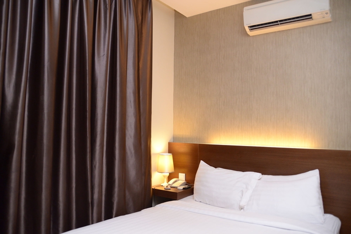 Imagen de la habitación del Hotel The Marque Kuala Lumpur. Foto 9