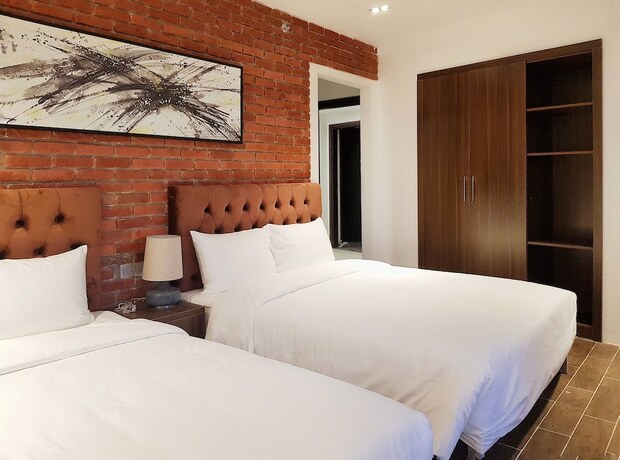 Imagen de la habitación del Hotel The Marron. Foto 22