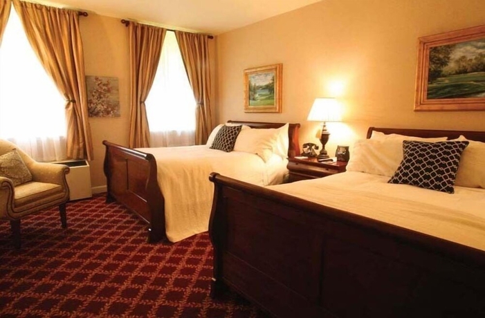 Imagen de la habitación del Hotel The Martha Washington Inn And Spa. Foto 10