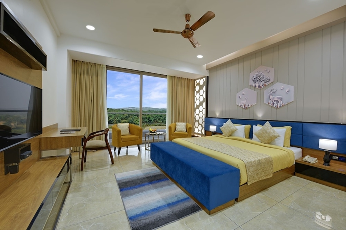 Imagen de la habitación del Hotel The Maruti Nandan Grand. Foto 5