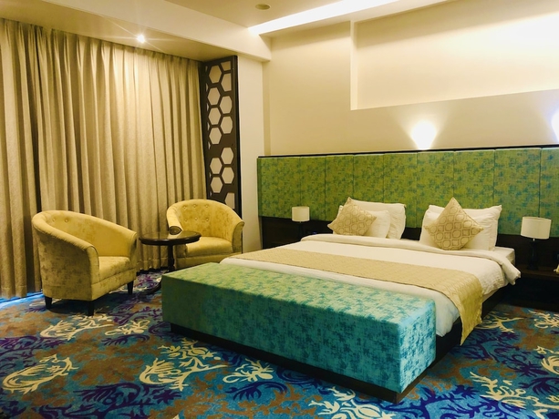 Imagen de la habitación del Hotel The Maruti Nandan Grand. Foto 6