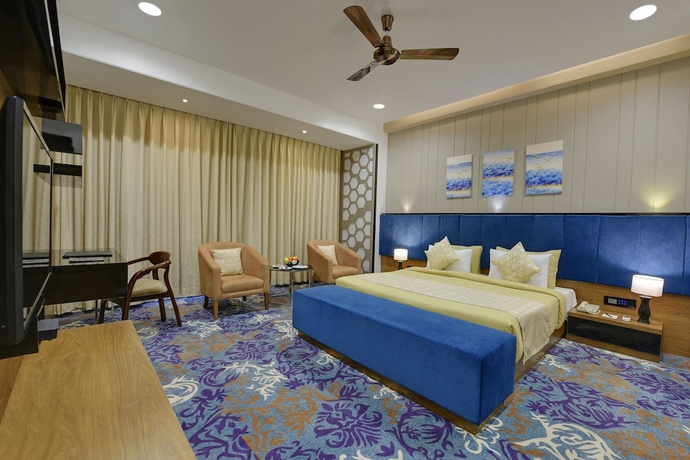 Imagen de la habitación del Hotel The Maruti Nandan Grand. Foto 8