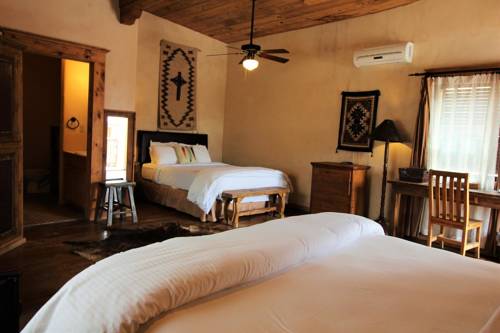 Imagen de la habitación del Hotel The Maverick Inn. Foto 9