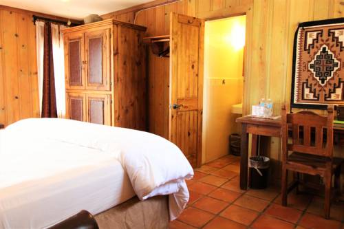 Imagen de la habitación del Hotel The Maverick Inn. Foto 10