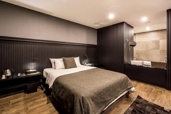 Imagen de la habitación del Hotel The May. Foto 8