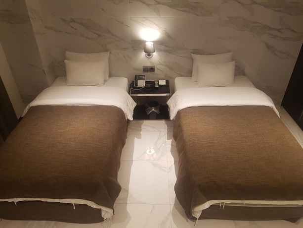 Imagen de la habitación del Hotel The May. Foto 12