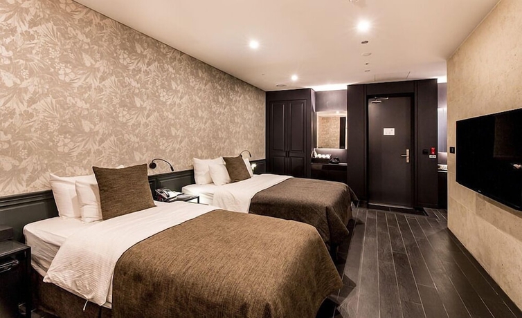 Imagen de la habitación del Hotel The May. Foto 15