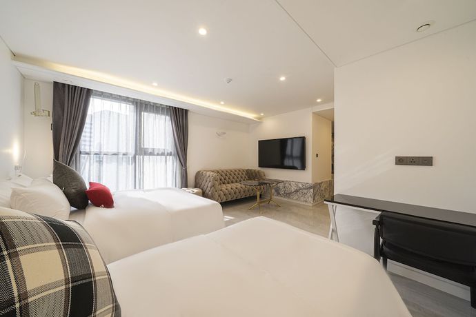 Imagen de la habitación del Hotel The May Hotel. Foto 3