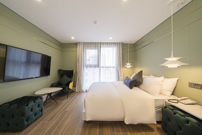 Imagen de la habitación del Hotel The May Hotel. Foto 7