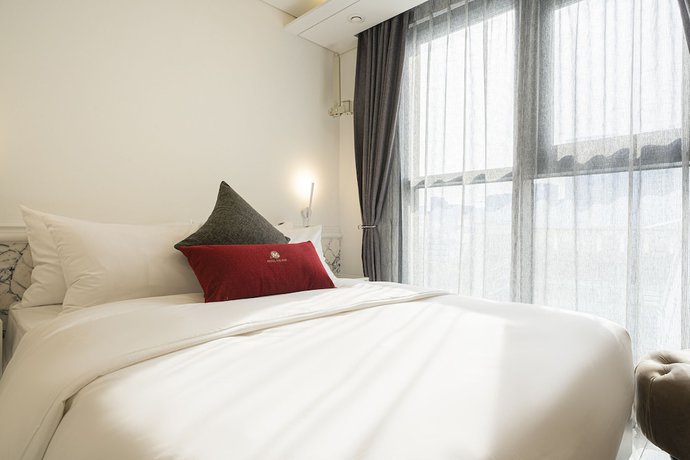 Imagen de la habitación del Hotel The May Hotel. Foto 12