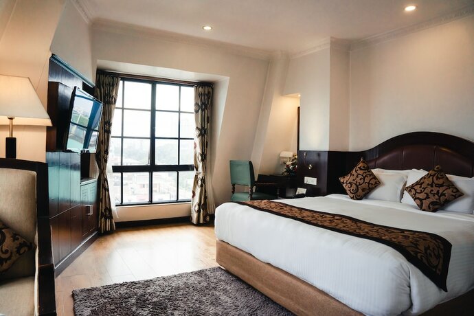 Imagen de la habitación del Hotel The Maya Manor Boutique By Kgh Group. Foto 17