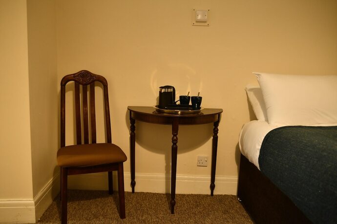 Imagen de la habitación del Hotel The Maycliffe. Foto 11