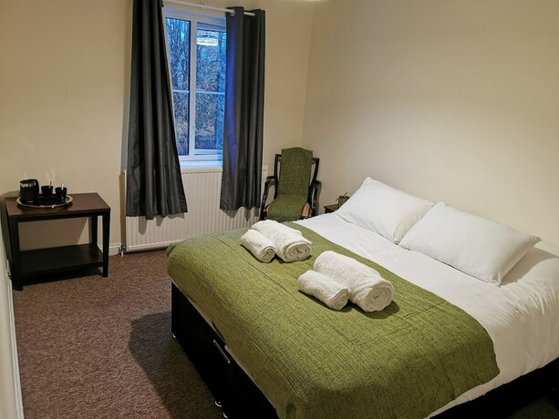 Imagen de la habitación del Hotel The Maycliffe. Foto 14