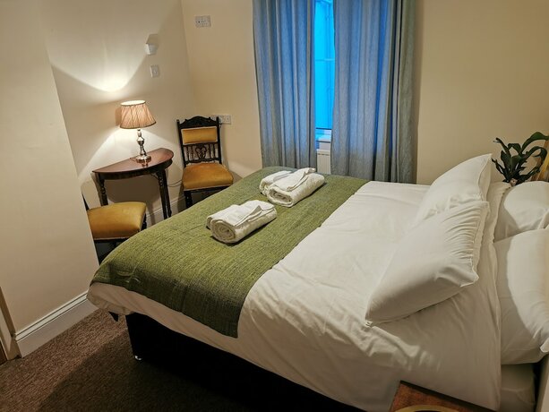 Imagen de la habitación del Hotel The Maycliffe. Foto 16