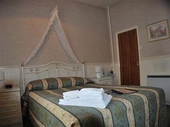 Imagen de la habitación del Hotel The Maynard. Foto 10