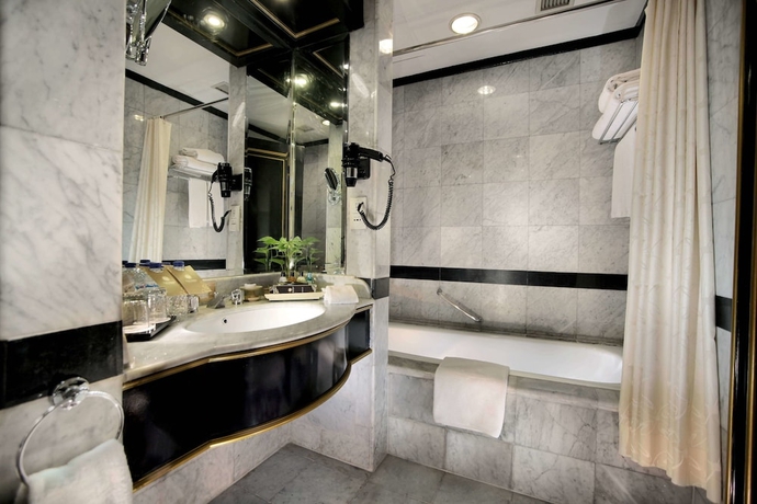 Imagen de la habitación del Hotel The Media and Towers. Foto 14