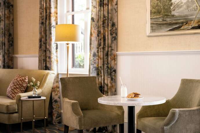 Imagen del bar/restaurante del Hotel The Meeting Street Inn. Foto 8