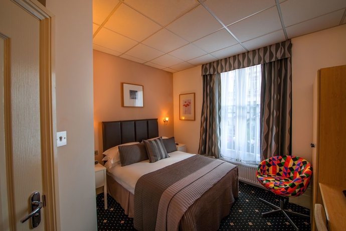 Imagen de la habitación del Hotel The Melita. Foto 8