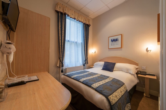 Imagen de la habitación del Hotel The Melita. Foto 10