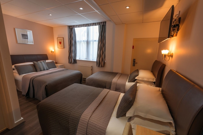 Imagen de la habitación del Hotel The Melita. Foto 13