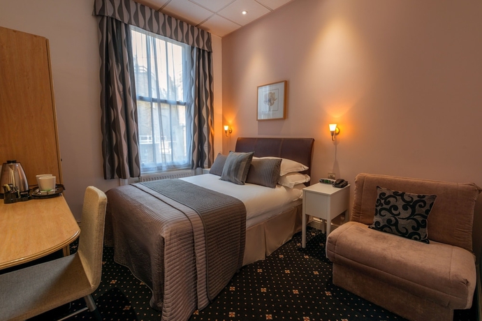 Imagen de la habitación del Hotel The Melita. Foto 15