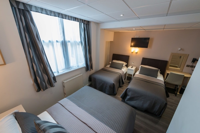 Imagen de la habitación del Hotel The Melita. Foto 16