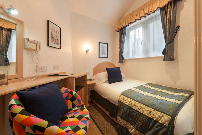 Imagen de la habitación del Hotel The Melita. Foto 17