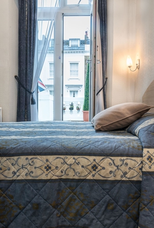 Imagen de la habitación del Hotel The Melita. Foto 18