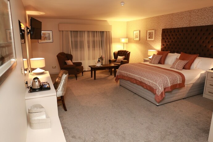 Imagen de la habitación del Hotel The Mellon Country Inn. Foto 18