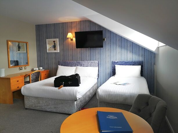 Imagen de la habitación del Hotel The Mellon Country Inn. Foto 20