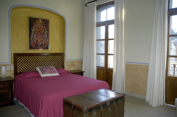 Imagen de la habitación del Hotel The Melville Boutique. Foto 2