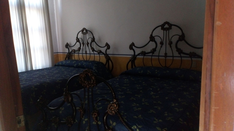 Imagen de la habitación del Hotel The Melville Boutique. Foto 5