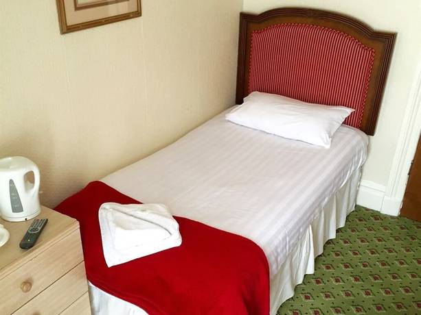 Imagen de la habitación del Hotel The Melville. Foto 9