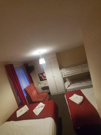 Imagen de la habitación del Hotel The Melville. Foto 13
