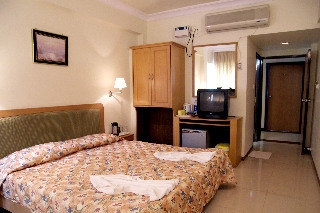 Imagen de la habitación del Hotel The Menino Regency. Foto 2