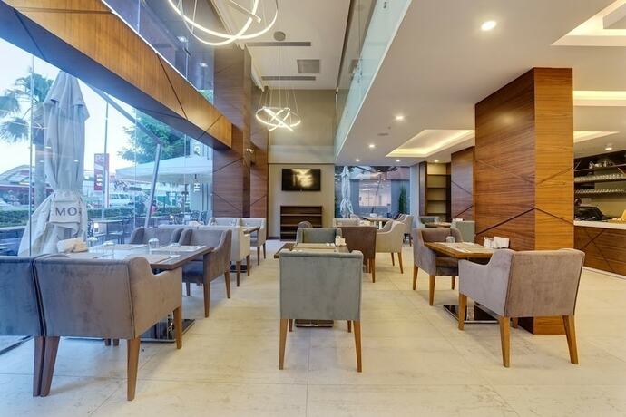 Imagen del bar/restaurante del Hotel The Menord. Foto 10