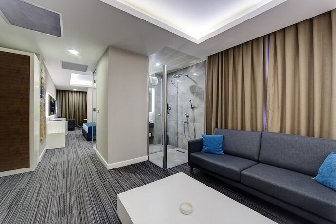Imagen de la habitación del Hotel The Menord. Foto 15