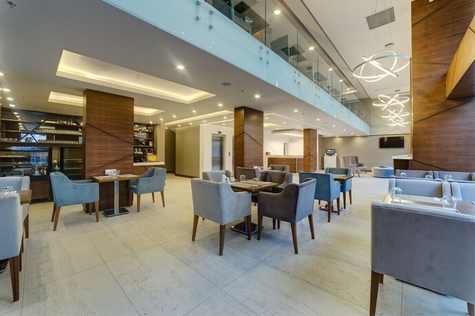 Imagen de la habitación del Hotel The Menord. Foto 16
