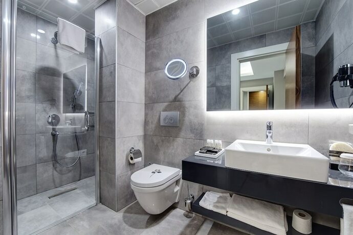 Imagen de la habitación del Hotel The Menord. Foto 17