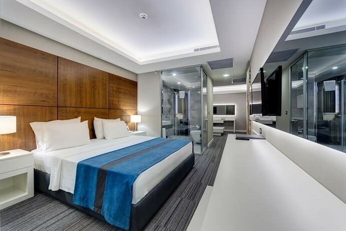 Imagen de la habitación del Hotel The Menord. Foto 19