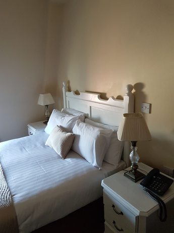 Imagen de la habitación del Hotel The Mercantile. Foto 9