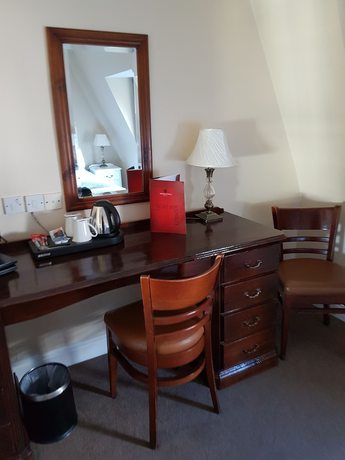 Imagen de la habitación del Hotel The Mercantile. Foto 10