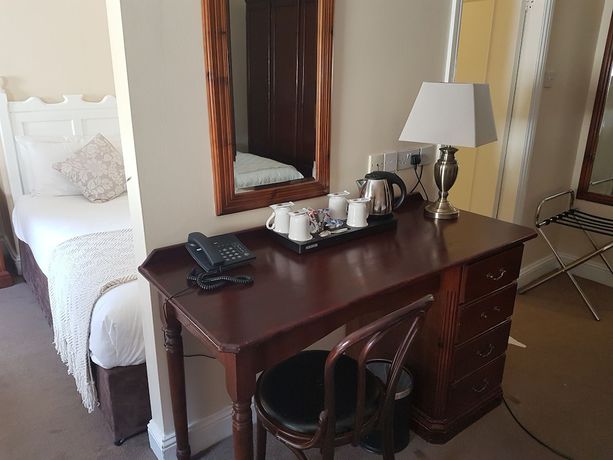 Imagen de la habitación del Hotel The Mercantile. Foto 12