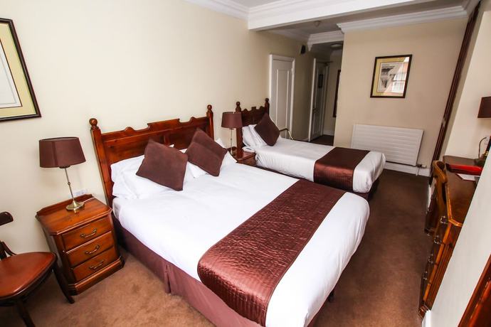 Imagen de la habitación del Hotel The Mercantile. Foto 13