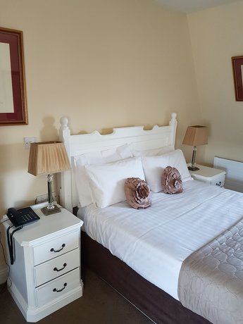 Imagen de la habitación del Hotel The Mercantile. Foto 15